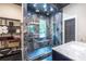 Luxury shower with black and grey marble and dual shower heads at 4850 Lake Fjord Pass, Marietta, GA 30068