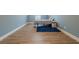 Expansive, blue bedroom showcasing ample space and a cozy bed with a stylish, darker blue rug at 549 Greenridge Ln, Loganville, GA 30052