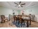 Classic dining room featuring a wood table, wainscoting, and stylish furnishings at 549 Greenridge Ln, Loganville, GA 30052
