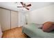 Comfortable bedroom featuring hardwood floors, neutral walls, and a ceiling fan for a peaceful retreat at 1438 Heritage Glen Dr, Marietta, GA 30068