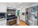 Efficiently designed kitchen with stainless appliances and hardwood floors at 1438 Heritage Glen Dr, Marietta, GA 30068