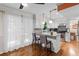 Bright kitchen with granite countertops, white cabinets, stainless steel appliances, and a breakfast bar at 1438 Heritage Glen Dr, Marietta, GA 30068