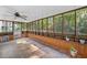 Screened patio with wood paneled knee wall at 1438 Heritage Glen Dr, Marietta, GA 30068