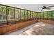 Screened patio with wood paneled knee wall at 1438 Heritage Glen Dr, Marietta, GA 30068
