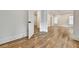 Hallway with open door and hardwood floors at 2179 William Way, Atlanta, GA 30345