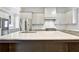 Spacious kitchen featuring quartz countertops, stainless steel appliances, and custom cabinetry at 2179 William Way, Atlanta, GA 30345