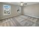 Unstaged bedroom featuring neutral carpet, fresh paint and lots of natural light at 2555 Flat Shoals Rd # 3405, Atlanta, GA 30349