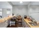 Features a countertop, sink, storage, and decorative lighting that enhances the bar's ambiance at 2935 Sawgrass Sw Trl, Lilburn, GA 30047