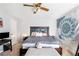 Comfortable bedroom with soft lighting, a decorative wall hanging, and a well-organized layout at 2935 Sawgrass Sw Trl, Lilburn, GA 30047