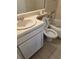Small bathroom with toilet and sink at 437 Saint Ives Sq, Stone Mountain, GA 30083