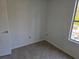 Bedroom with a window and closet at 437 Saint Ives Sq, Stone Mountain, GA 30083