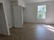 Bedroom with a window and closet at 437 Saint Ives Sq, Stone Mountain, GA 30083