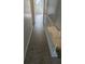 Hallway with a railing and door at the end at 437 Saint Ives Sq, Stone Mountain, GA 30083