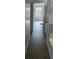 Hallway leading to a room with a window at 437 Saint Ives Sq, Stone Mountain, GA 30083