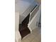 Stairway with wooden steps and white railing leading to the upper level, showcasing a clean design at 437 Saint Ives Sq, Stone Mountain, GA 30083