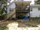 Spacious backyard with a deck and plenty of room for activities at 49 Brinkley Ct, Dallas, GA 30157
