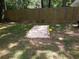 Backyard with a horseshoe pit ready for play at 49 Brinkley Ct, Dallas, GA 30157