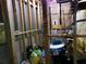 Unfinished basement ready for customization with exposed framing, utilities and personal items at 49 Brinkley Ct, Dallas, GA 30157