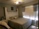 Cozy bedroom featuring a comfortable bed with bright natural light shining through window at 49 Brinkley Ct, Dallas, GA 30157