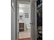 View of a half-bathroom featuring a modern vanity and toilet at 440 Berckman Nw Dr, Lilburn, GA 30047
