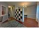 Open-concept space with hardwood floors, modern storage, and a view into the dining area at 440 Berckman Nw Dr, Lilburn, GA 30047