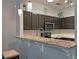 Kitchen featuring granite countertop breakfast bar and stainless steel appliances at 440 Berckman Nw Dr, Lilburn, GA 30047