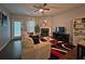 Well-appointed living room featuring a fireplace, entertainment center, and lots of natural light at 440 Berckman Nw Dr, Lilburn, GA 30047