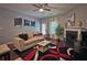 Cozy living room with decorative fireplace, comfortable couch, and modern decor at 440 Berckman Nw Dr, Lilburn, GA 30047