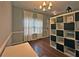 Bright office featuring storage shelving, natural light, and hardwood floors at 440 Berckman Nw Dr, Lilburn, GA 30047