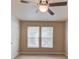 Bedroom featuring neutral paint, carpet flooring and a ceiling fan at 1727 Shire Village Dr, Sugar Hill, GA 30518