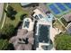 Aerial view of the pool and tennis courts and parking area at 2640 Preston Ridge Ln, Dacula, GA 30019