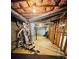 Unfinished basement featuring exposed duct work and beams with exercise equipment at 2640 Preston Ridge Ln, Dacula, GA 30019