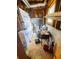 Cluttered, unfinished basement area with exposed beams and concrete floor at 2640 Preston Ridge Ln, Dacula, GA 30019