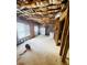 Unfinished basement area with washer, dryer and exposed ceiling at 2640 Preston Ridge Ln, Dacula, GA 30019