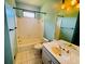 Inviting bathroom with a tub and shower combination, with a vanity and tile flooring at 2640 Preston Ridge Ln, Dacula, GA 30019