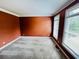 Spacious bedroom with carpet, neutral walls, and natural light from two windows at 2640 Preston Ridge Ln, Dacula, GA 30019