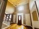 Inviting foyer featuring gleaming hardwood floors and a stately front door at 2640 Preston Ridge Ln, Dacula, GA 30019