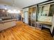 Spacious kitchen with a large center island, stainless steel appliances, and hardwood floors at 2640 Preston Ridge Ln, Dacula, GA 30019