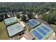 Aerial view of the tennis courts and parking area at 2640 Preston Ridge Ln, Dacula, GA 30019