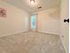 Bedroom featuring a carpeted floor, a window and neutral colored walls at 2647 Midler Ct, Buford, GA 30519