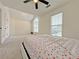 Spacious bedroom featuring vaulted ceilings, carpeted floor, and natural light at 2647 Midler Ct, Buford, GA 30519