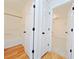 Hallway view to bathroom and bedroom with white doors at 2647 Midler Ct, Buford, GA 30519