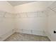 Spacious walk-in closet with wire shelving at 2647 Midler Ct, Buford, GA 30519