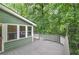 Charming backyard deck surrounded by nature, perfect for relaxing and enjoying the outdoors at 425 Bellflower Ct, Roswell, GA 30076