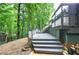 Multi-level deck, stone waterfall and gravel backyard offer amazing outdoor space at 425 Bellflower Ct, Roswell, GA 30076