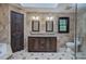 Elegant bathroom featuring a double sink vanity, framed mirrors, and a separate shower and toilet area at 425 Bellflower Ct, Roswell, GA 30076