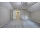 The spacious bedroom boasts vaulted ceilings and new carpeting at 425 Bellflower Ct, Roswell, GA 30076