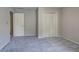 Bedroom with double closets and neutral carpeting at 425 Bellflower Ct, Roswell, GA 30076