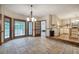 Eat-in kitchen, with access to the deck, and updated kitchen featuring stainless appliances at 425 Bellflower Ct, Roswell, GA 30076