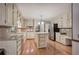 Spacious kitchen with stainless steel appliances, granite countertops, and center island at 425 Bellflower Ct, Roswell, GA 30076